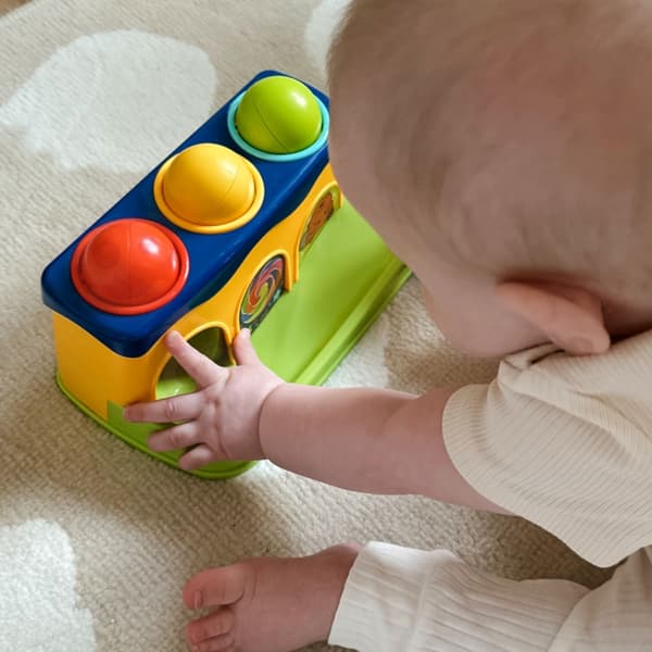 WOOPIE BABY Värikäs läpiheitolelu Montessori-vasaralla