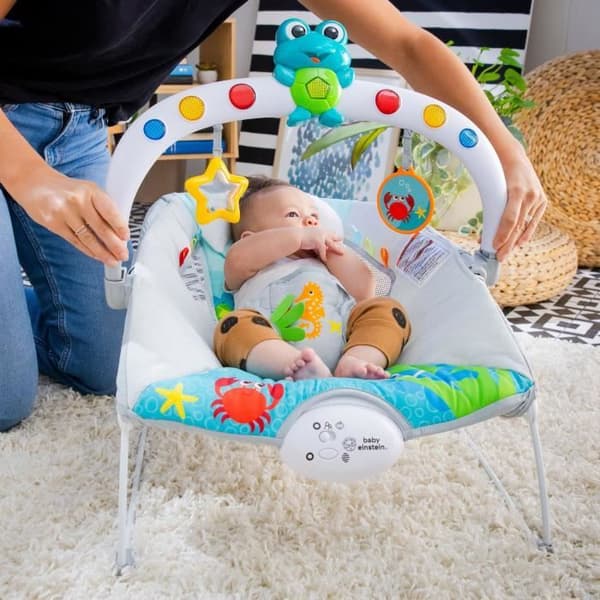 BABY EINSTEIN Neptune Bouncer - Meriseikkailijat, 15 melodiaa, valot, värinät