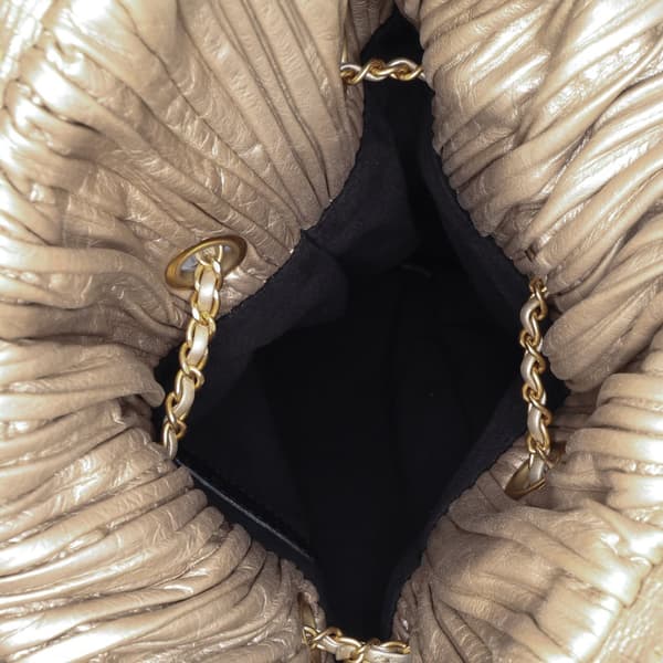Pre-owned Chanel Medium Metallic Calfskin Coco Pleats Drawstring Backpack Gold