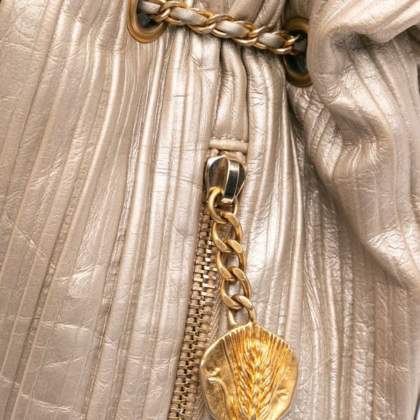 Pre-owned Chanel Small Metallic Calfskin Coco Pleats Drawstring Backpack Gold