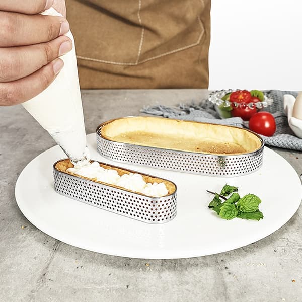 Form tartletkant perforerad 15x5xh2cm oval tartkant