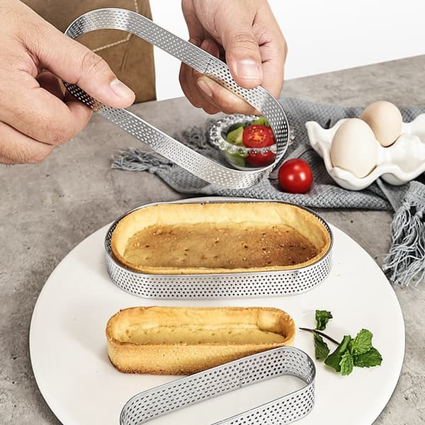 Form tartletkant perforerad 15x5xh2cm oval tartkant