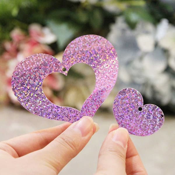 Glitter draperi med hjerter metallisk rosa