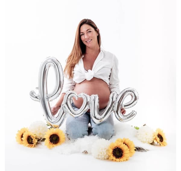 Bokstavene 'Love Script Silver'