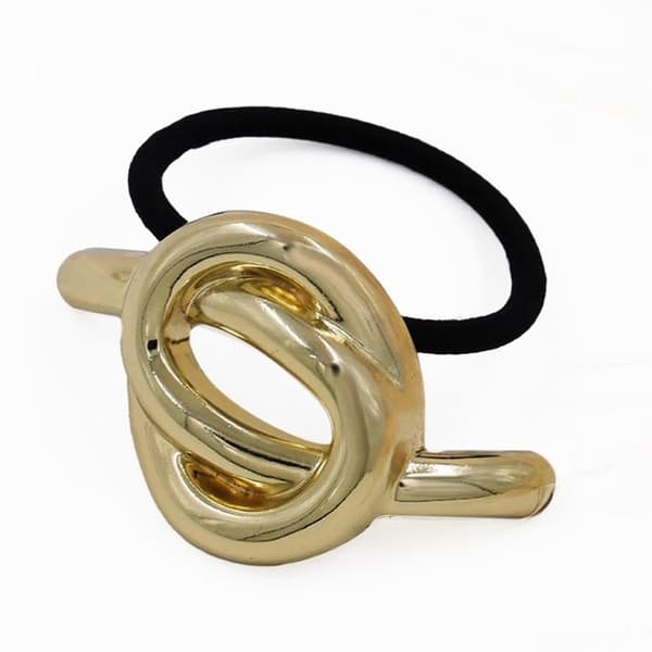 Elastisk fantasi för hår, skulpturell chic knut i guld