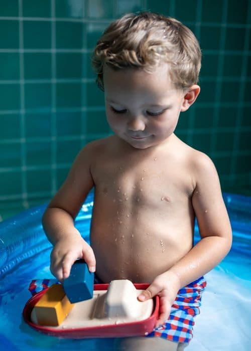 Plan Toys - Stor röd modulbåt 21 cm - BYXA