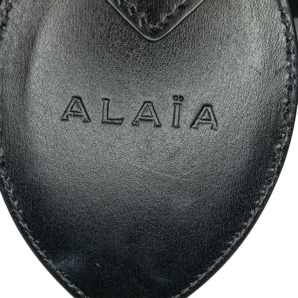 Pre-owned ALAÏA Calfskin Eyelet Bracelet Embellished Bucket Bag Black