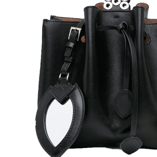 Pre-owned ALAÏA Calfskin Eyelet Bracelet Embellished Bucket Bag Black