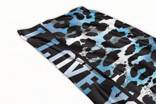 Strandhandduk 100x180 blå svart leopard