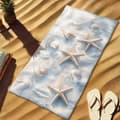 Pikkukuva 2 / 4: Bomclap Rantapyyhe 70x140cm - Seestern und Muscheln - Design - Kylpypyyhe Matkapyyhe