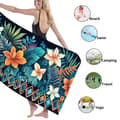 Pikkukuva 3 / 4: Bomclap Rantapyyhe 70x140cm - Türkisfarbene Blätter mit orangenen und weißen Blumen und geometrischem Muster - Kylpypyyhe Matkapyyhe