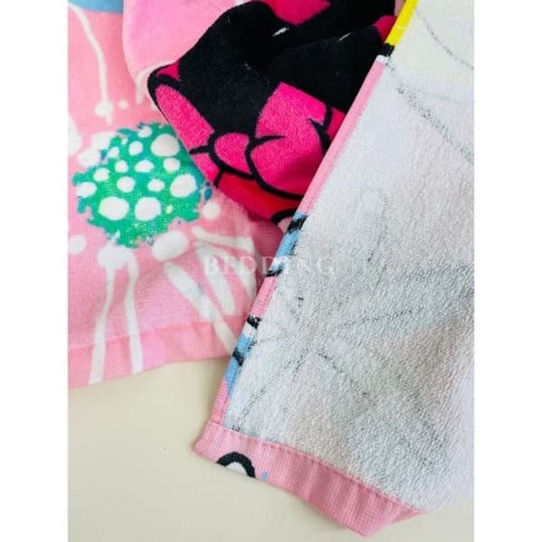 Minnie Mouse handduk i 100% bomull med rosa rosett