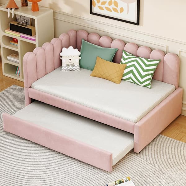 L-format polsterbäddsoffa 140x200 i rosa sammet med blommigt ryggstöd och utdragbar extrasäng