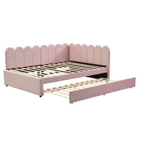 L-format polsterbäddsoffa 140x200 i rosa sammet med blommigt ryggstöd och utdragbar extrasäng