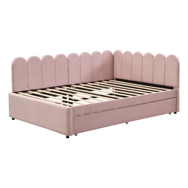 L-format polsterbäddsoffa 140x200 i rosa sammet med blommigt ryggstöd och utdragbar extrasäng
