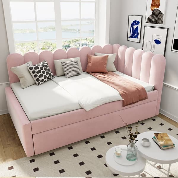L-format polsterbäddsoffa 140x200 i rosa sammet med blommigt ryggstöd och utdragbar extrasäng