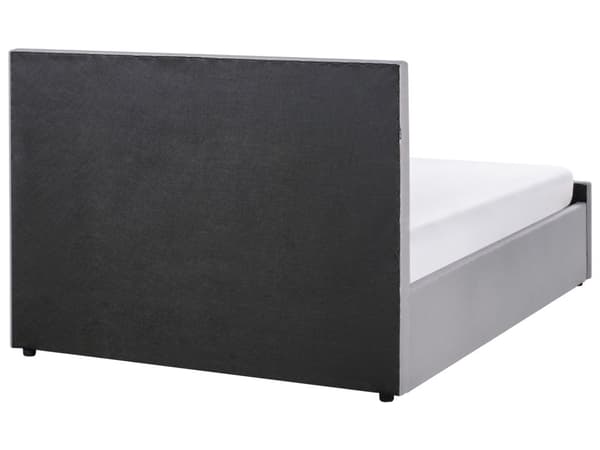 En dobbeltseng med opbevaring lysegrå stofbetræk 140 x 200 cm med en opbevaringsboks løftet