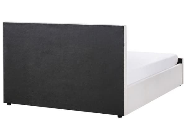 En dobbeltseng med opbevaring beige stofbetræk 160 x 200 cm med en opbevaringsboks løftet