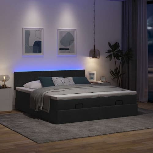 Ottoman sängram med madrasser svart 180x200 cm tyg