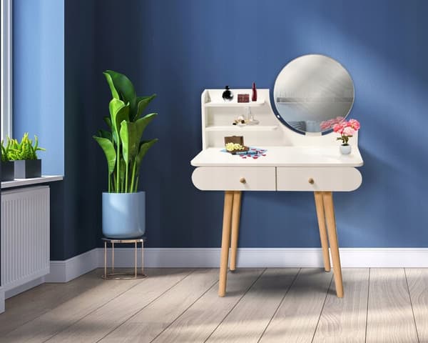 Moderne hvid toiletbord med rundt spejl og opbevaringsskuffer til elegante interiører