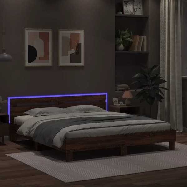 sengeramme med sengegavl og LED-lys 180x200 cm brunt egetræ