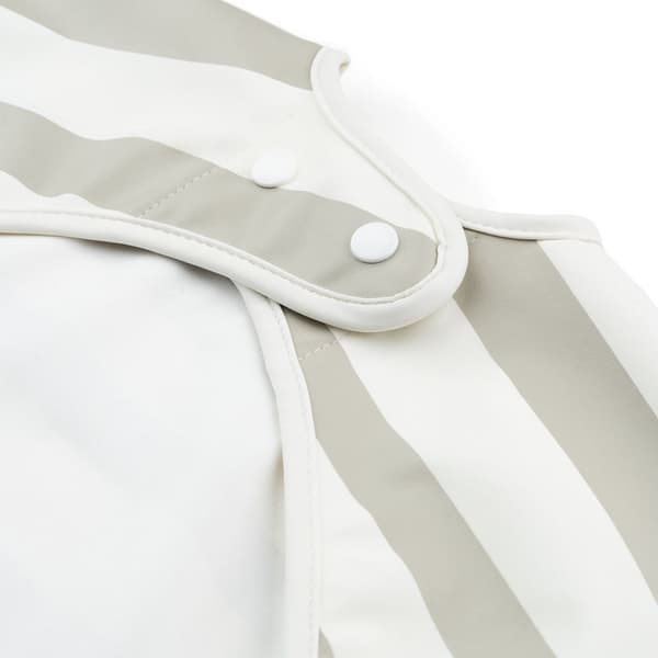 Done by Deer Sleeved pocket bib Stripes Sand
