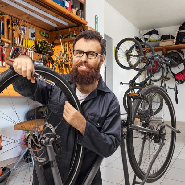 Relaxdays Väggfäste för cykel, set om 2, hopfällbar, bär upp till 25 kg, vertikal väggmontering, gul