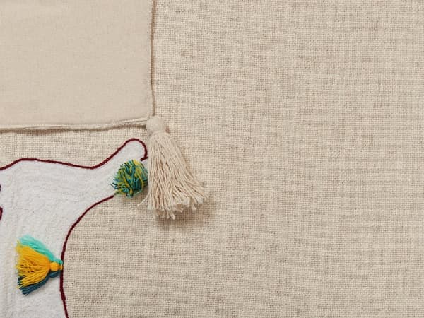 Huopa beige/ruskea 130 x 180 cm puuvilla tupsut laamakuvio viltti boho retro