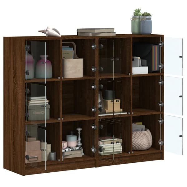 vidaXL bogreol med låger 136x37x109 cm konstrueret træ brunt eg