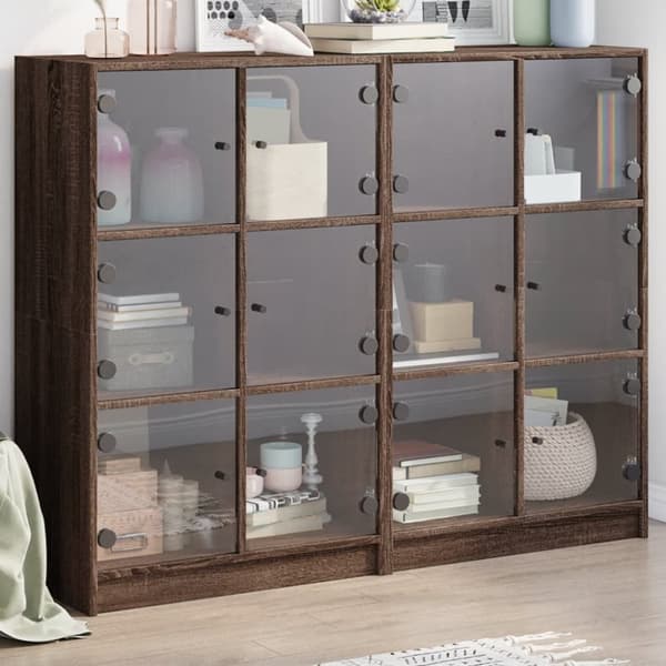 vidaXL bogreol med låger 136x37x109 cm konstrueret træ brunt eg
