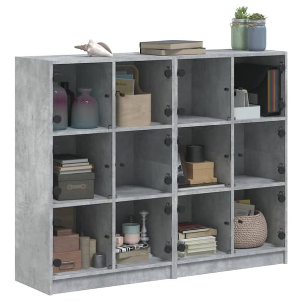 vidaXL bogreol med låger 136x37x109 cm konstrueret træ betongrå