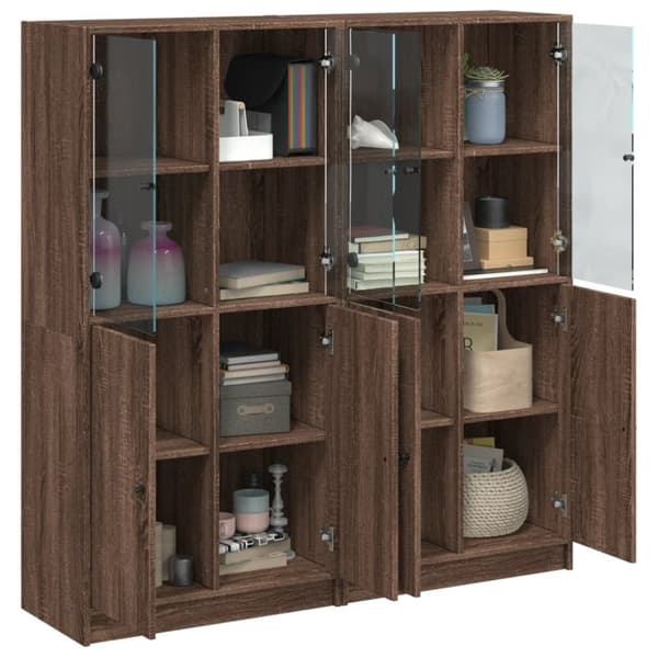 vidaXL bogreol med låger 136x37x142 cm konstrueret træ brunt eg