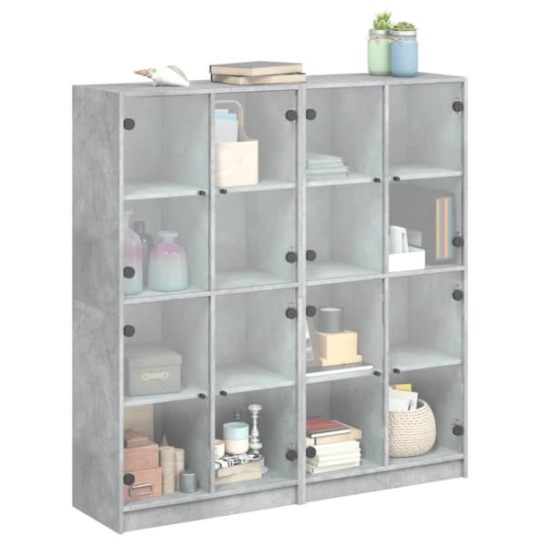 vidaXL bogreol med låger 136x37x142 cm konstrueret træ betongrå