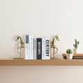 Miniatyrbild 2 av 6: Relaxdays Bokstöd i 2 delar, varje prydd med en häst, elegant design, H x B x D: 26,5 x 9 x 13 cm, natur/guld