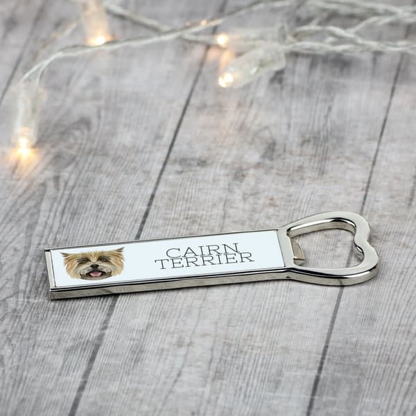 Cairn Terrier - pullonavaaja valokuvalla ja kirjoituksella Art-Dog-oluelle