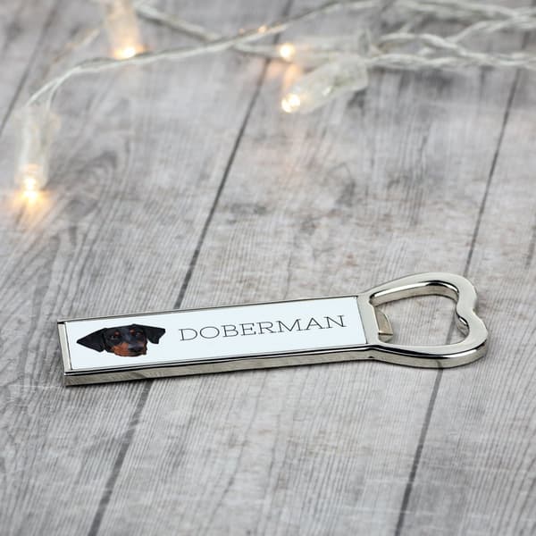 Doberman, Dobermann - pullonavaaja kuvalla ja kirjoituksella Art-Dog-oluelle