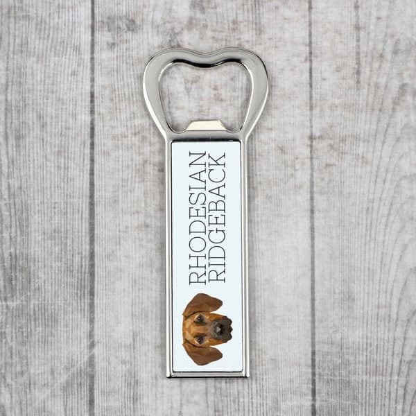 Rhodesian Ridgeback, afrikkalainen leijonakoira - pullonavaaja valokuvalla ja kirjoituksella Art-Dog-oluelle