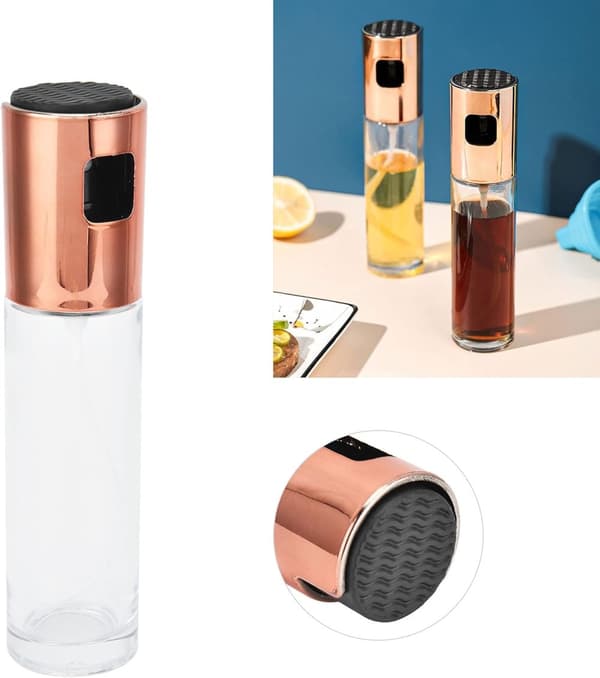 Glasflaska med en olivolja spruta och ett kopparlock