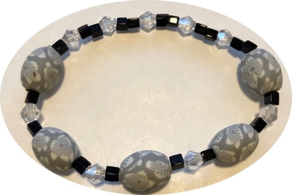 oval fimo pärlor med glas bicone armband