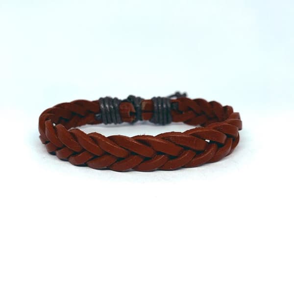 Handgjort flätat armband i orange läder
