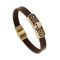 Miniatyrbild 1 av 4: Brunt armband i äkta läder med dödskalle i guld och magnet