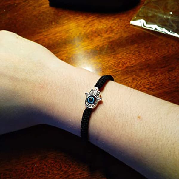 INF Macramé armbånd med beskyttende Hamsa hånd Sort