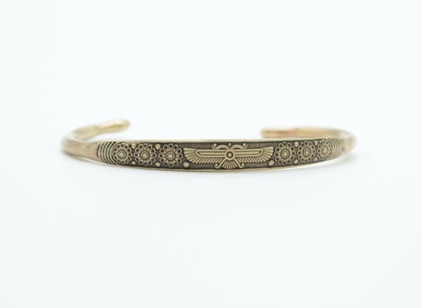 Armband i koppar med emblem Faravahar Persisk kultur historia justerbart
