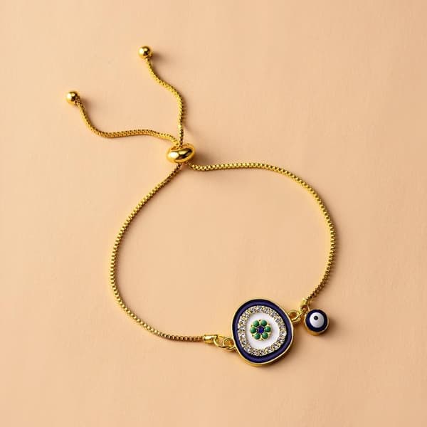 Armband i Guld färg med onda ögat & strass