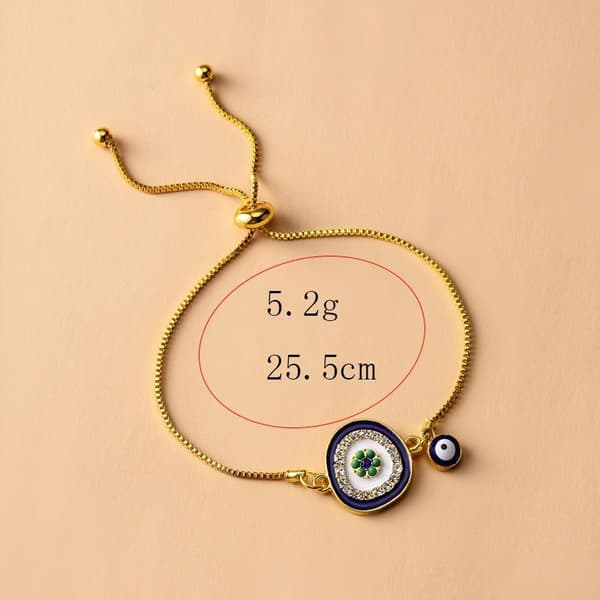 Armband i Guld färg med onda ögat & strass