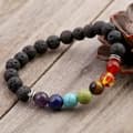 Miniatyrbild 1 av 2: Armband - Euramerikansk - Vésuvianit - 18cm - Unisex - 7 charm chakra pärlor