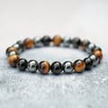 Miniatyrbild 3 av 4: Armband - SHOP-STORY - Trippelskydd - Tigeröga - Hematit - Svart Obsidian