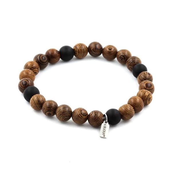 Stenar och mineraler. Armband Mattsvart Onyxpärlor + trä 8 mm. Tillverkad i Frankrike.