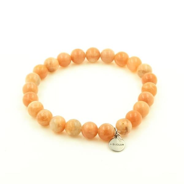 Stenar och mineraler. African Sunstone Beads Armband 7A kvalitet 8 mm. Tillverkad i Frankrike. Anpassningsbar storlek.