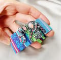 Miniatyrbilde 1 av 3: Fabric band with colored ethnic elephant beads